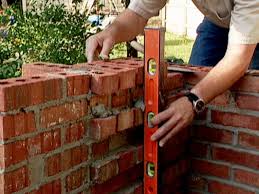 Use a brick jointer to clean the excess mortar between the bricks and to get the concave cavities look. How To Build A Brick Barbecue How Tos Diy