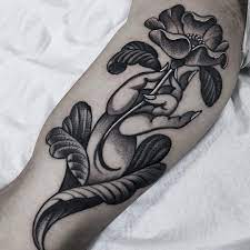 I still have to add color… this tattoo represents the three main characters i created to survive abuse 20. Flowers That Represent Death Of A Loved One Tattoo