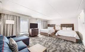 You can offer a sitting and sleeping space in one! Two Queen Beds Studio With Sofa Bed Picture Of Hampton Inn Suites Atlanta Galleria Tripadvisor
