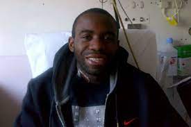 Fabrice muamba, the soccer player who suffered a cardiac arrest 41 minutes into a game on saturday, is said to be showing signs of improvement. muamba has been visited in hospital by his club chairman mark gartside and manager owen coyle. Smiling From His Hospital Bed First Picture Of Fabrice Muamba Just Weeks After Collapsing On Pitch With Heart Attack London Evening Standard Evening Standard