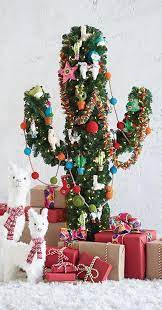 Looks beautiful during the day and glows at night with mini lights! Cactus Christmas Tree