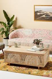 These hand carved coffee table are offered in various shapes and sizes ranging from trendy to classic ones. Lovella Whitewash Carved Trunk Coffee Table