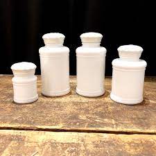 Vintage dishes vintage glassware antique bottles vintage perfume glass dishes candy dishes candy jars glass apothecary jars mason jars. Set Of 4 Milk Glass Apothecary Jars With Lids