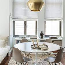 Handmade in wisconsin, our modern aria round dining table has a steel pedestal base perfect for small spaces. Round White Dining Table With Gray Dining Chairs Contemporary Dining Room
