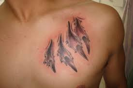 20 Amazing Ripped Skin Tattoos To Unleash Your Inner Beast Tattoos Wolf Tattoos Ripped Skin Tattoo