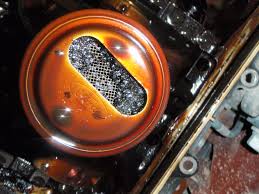 If your engine is locked up, you will find yourself in a tough situation. Clogged Up Oil Screen From A Lack Of Oil Changes After This Engine Ran For A Bit The Built Up Sludge In The O Oil Pan Oil Pressure Past The Point