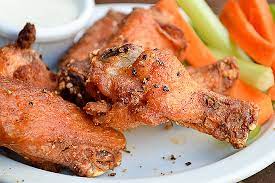 These wings pack a double punch with sassy flavors in the chicken coating and in the dipping sauce. Mesquite Smoked And Fried Chicken Wings Perfectly Seasoned Accompanied With Celery And Carrot S Picture Of The Horseshoe Grill Tucson Tripadvisor