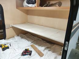A bunk bed that save space by folding into a wall. Teardrops N Tiny Travel Trailers View Topic Fold Up Bunk Ideas