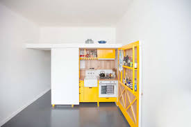 ultra small kitchen with bold yellow