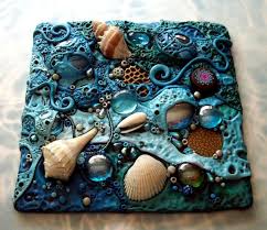 These adorable little seashell tealights are so easy to make and best of all, you can fill them with whatever scent you prefer. Mosaic Art Tile Polymer Clay Found Objects Sea Shells At Mosaic Art Tile Art Clay