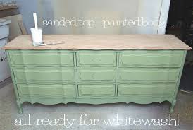 A simple color washing technique for a layered color look. How To Whitewash Wood Furniture Salvaged Inspirations