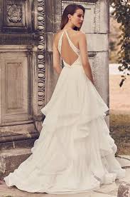 High neck wedding dresses run a wide range, with dress necklines skimming collarbones to circling the entirety of the neck. Tulle Skirt Halter Neckline Wedding Dress Style 2241 Mikaella Bridal