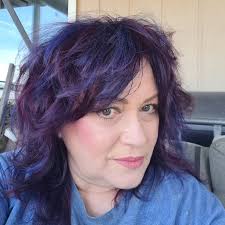 What books combine suburban housewife drama with murder mystery?