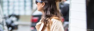 A bun is a type of hairstyle in which the hair is pulled back from the face, twisted or plaited, and wrapped in a circular coil around itself, typically on top or back of the head or just above the neck. Why Give In To The Half Bun Trend