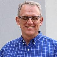 In the Name of God: The Colliding Lives, Legends, and Legacies of J. Frank  Norris and George W. Truett by O.S. Hawkins