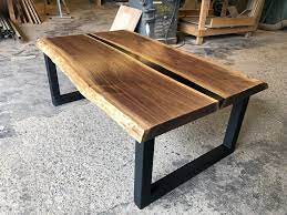 Turn this exotic wood slab into a funtional piece of valuable art with stone coat epoxy! Walnut Resin Coffee Table Higgins Fabrication