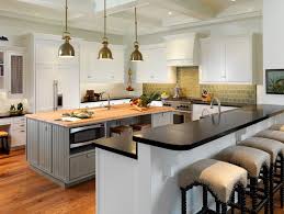Simple white chairs fit the sleek modern design of this kitchen. Kitchen Island Bar Stools Pictures Ideas Tips From Hgtv Hgtv