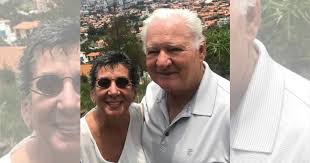 Villager fights to keep landscaping that was wife's labor of love