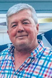 JOHN F. "CHARLIE" EVANS