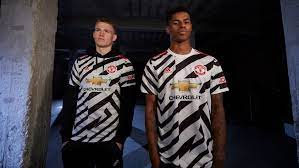 Specifically, the navy blue piece is inspired by the royal blue kit donned by the united team that scored a victory in the 1968 european cup final. Manchester United Reveals Dazzle Camouflage Kit For 2020 21 Season