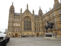 Rally outside Guildhall protests government's deportation flight