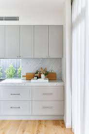 Now we have moved and the kitchen is my dream white! Grey Cabinets Subtle Front Detail Marble Look Splashback Interior Design Kitchen Home Kitchens Kitchen Interior