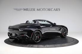 Image result for Marron Black 2021 Aston Martin