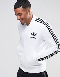 Adidas Originals Adicolor Track Jacket In White B10664 At Asos Com Men S Trench Coat Jacket Tops Adidas Originals Mens