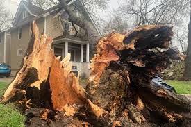 Floodwaters inundate Wisconsin streets, trapping drivers, as Midwest rebuilds after storms