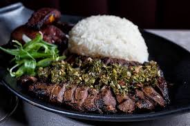Served on top of a pile of potato's and then top the beef with a sunny side up egg. Korean Steak Chimichurri With Maduros And White Rice Picture Of Casa Sensei Fort Lauderdale Tripadvisor