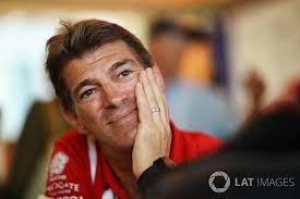 Who are the Formula 1 drivers' managers, and what do they do?