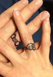 Infinity Wedding Ring Tattoos Designs Ring Tattoo Designs Tattoo Wedding Rings Wedding Band Tattoo
