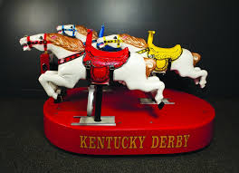The kentucky derby museum, located in the shadow of churchill downs' iconic twin spires, has a somewhat misleading name. Kentucky Derby Museum Shows Fun Side Of Derby With New Horse Play Exhibit International Sports Heritage Association