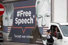 The laughing policeman is a mystery novel by the swedish writing duo maj sjöwall and per wahlöö, originally published in sweden in 1968 as den skrattande polisen and translated into english in 1970. A Policeman Directs A Van With A Free Speech Placard And The Images Of Wikileaks Founder Julian Assange And Whistleblower Chelsea Manning On Its Side Abc News Australian Broadcasting Corporation