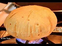 How To Make Soft And Puffed Roti Chapati Phulka Showing On Both Gas Stove And Tawa Indian Food Recipes Indian Bread Food