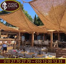 برجولة قماشية مظلة من قماش بي في سي العزيزية للبرجولات in 2021 outdoor cafe outdoor restaurant patio beach houses architecture
