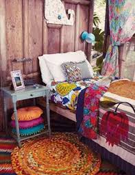 A boho chic bedroom with pastel pillows, printed blankets, layered rugs, a rattan bench and a wicker lamp. 35 Charming Boho Chic Bedroom Decorating Ideas Amazing Diy Interior Home Design