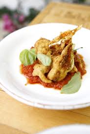 Drop squash blossoms into the boiling water until slightly wilted, 30 to 45 seconds; Stuffed Zucchini Blossoms With Goat Cheese