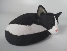 Memorials.com offers a wide selection of high quality cat urns at affordable prices. Sleeping Black And White Tuxedo Cat Shaped Cremation Urn For Ashes