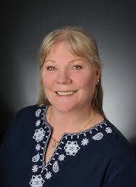 When it comes to encouraging others to lend a hand, Wolf Conservation  Center volunteer Barbara Mignano advises people to find something they have  real passion for