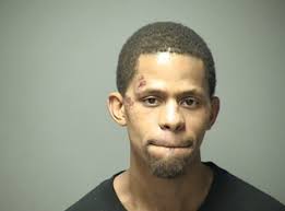 Man armed with loaded gun arrested after attempting to pull gun