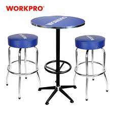 Each stool is crafted from iron in a bronze finish, and it's built on four tubular legs with a swivel seat and a thin, rounded footrest, offering some convenience while you sit. Workpro 3pc Bar Stools And Table Set High Quality Home Garage Steel Stools Table Bar Stools Aliexpress