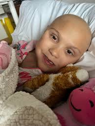 Ellie went over to Northwestern Hospital this morning to have her sedated  CT and radiation planning done. She did wonderful with it. She is still  feeling pretty sleepy from the anesthesia so