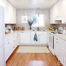 Get more kitchen storage in one weekend with these kitchen baseboard storage ideas. These White Kitchens Are Anything But Boring Kitchen Remodel Small Kitchen Remodel Layout Kitchen Layout