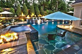 J Brownlee Pool Landscape Tanning Ledge Chairs Umbrella Outdoor Living Design Outdoor Living Geometric Pool