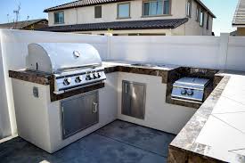 La custom grill islands now offers custom grill island covers for any size barbecue island, patio furniture, and umbrellas. Extreme Backyard Designs Outdoor Kitchens