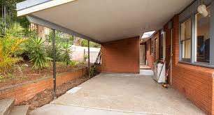 Turning a metal carport into a garage is simple in theory but involves a few steps in practice. How To Convert Your Carport Into An Outdoor Oasis Better Homes And Gardens