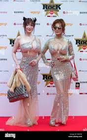 Tokyo, Japan - (L to R) Mika Kano and Kyoko Kano (Abunai Sisters) pose for  photographers on the red carpet during the Classic Rock Awards 2016 at  Ryougoku Kokugikan Stadium in Tokyo,