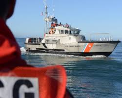 A Boat Crew Aboard A 47 Foot Motor Life Boat From Coast Guard Station Tillamook Bay Conducts Training Outside The T Coast Guard Coast Guard Ships Coast Gaurd