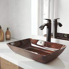 One of the easiest ways to bring a clean, crisp look to your bathroom vanity area is by incorporating a glass vessel sink. Vigo Russet Glass Rectangular Vessel Bathroom Sink With Faucet Reviews Wayfair